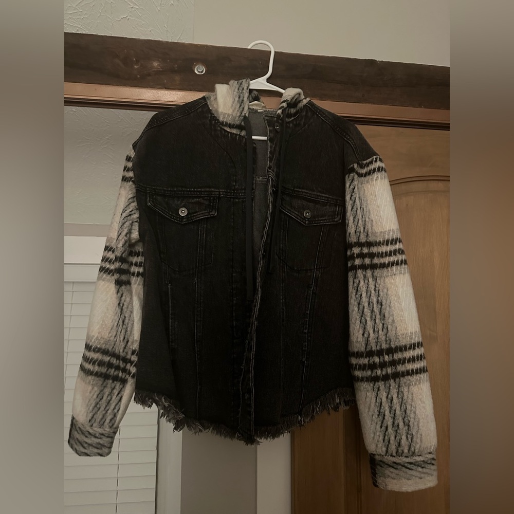Jean jacket with plaid sweater sleeves